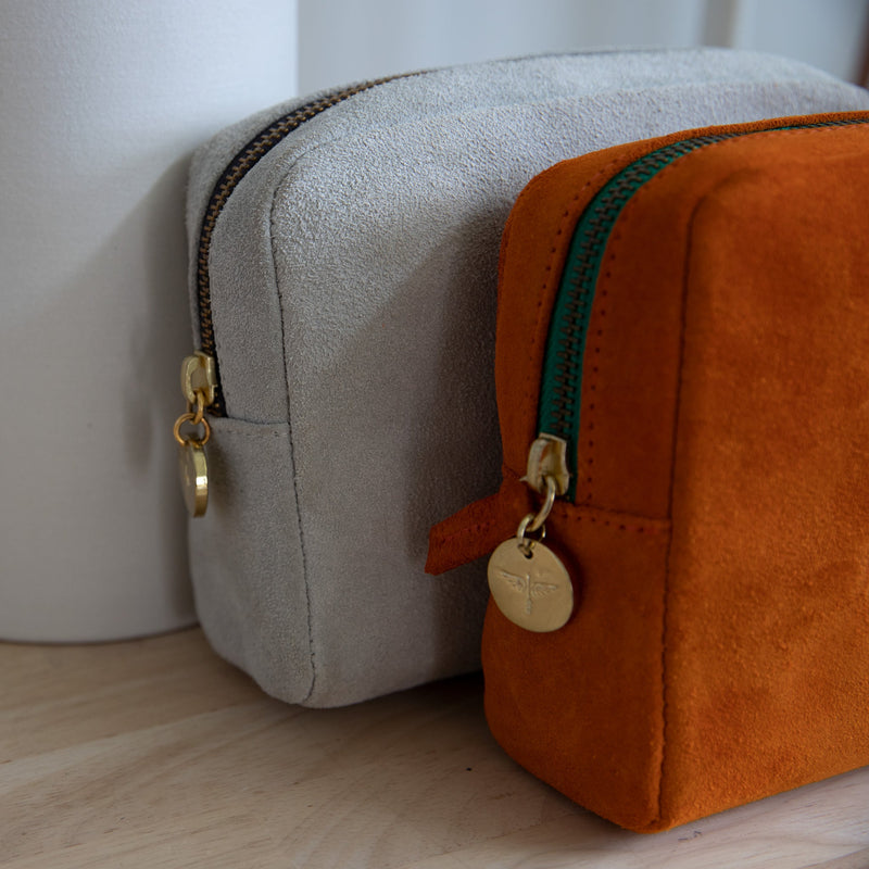 Coco pouches in Papaya and Chalk suede