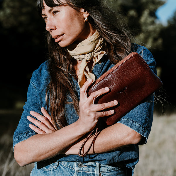 Photo of model holding Pouch wallet in Chestnut