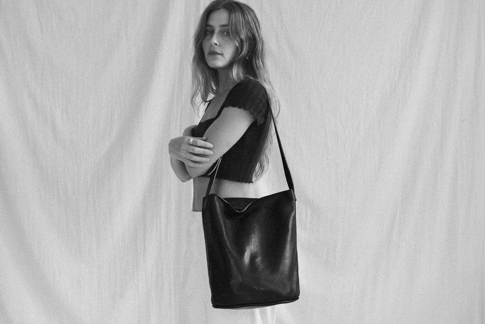 Makena in Black leather on model