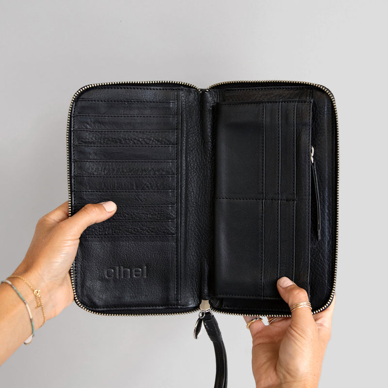 Zip Around Wallet in Black - interior  in hand
